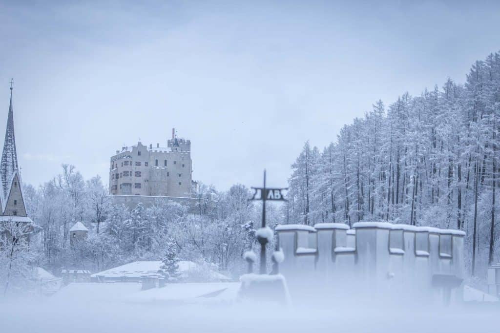 Image taken in Brunico in the winter of the Castle of Bruneck in the distance. A top ski resort in Italy for some of the best restaurants in the Dolomites 