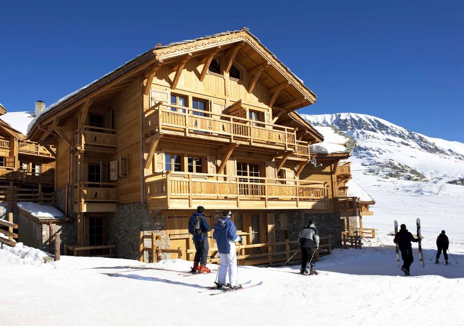 Exterior chalet shot of Chalet Le Manoir. Ski in ski out Alpe d'Huez chalets like Chalet Le Manoir are an expert choice for your holiday. 