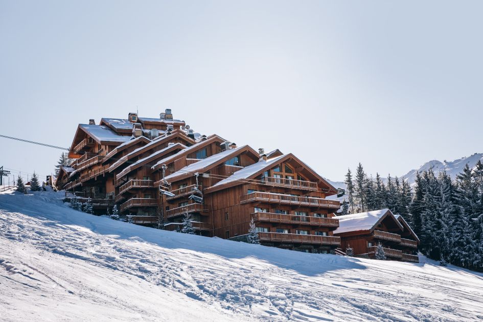 External view of Hotel Le Coucou which is positioned on the piste side and occupies luxury ski apartments. 