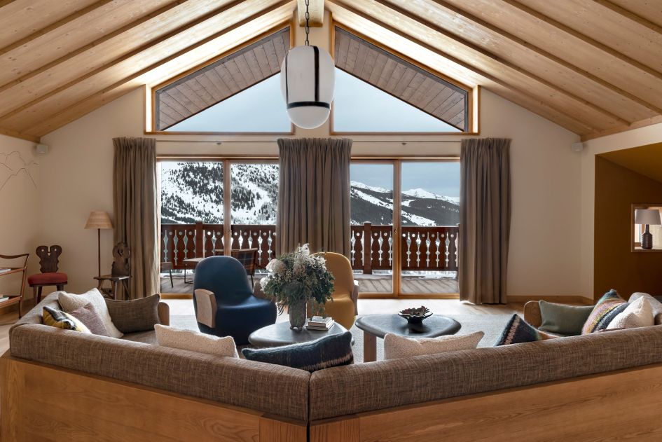 The living space at Chalet Eleonore showcasing stunning mountain views and stylish interiors 