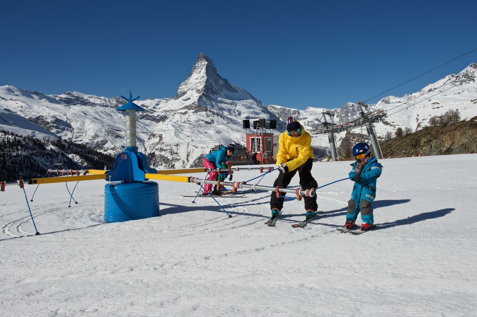 Teaching children how to ski at the Wolli Park, a beginner's area in the Sunnegga section of the Matterhorn Ski Paradise.