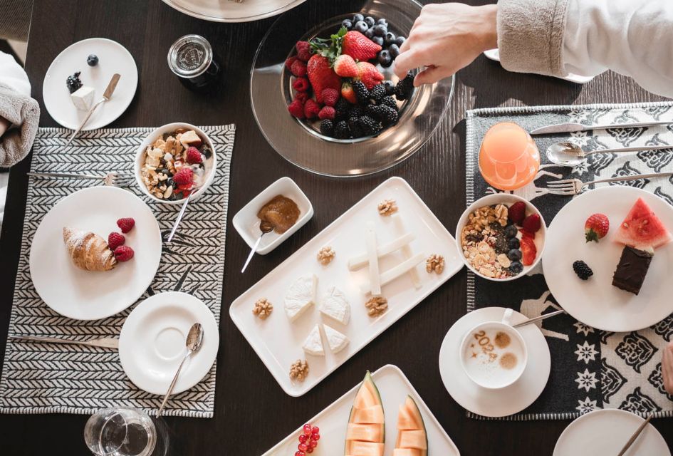 Breakfast spread laid out at Chalet Alpurio, a top catered chalet in Selva Val Gardena