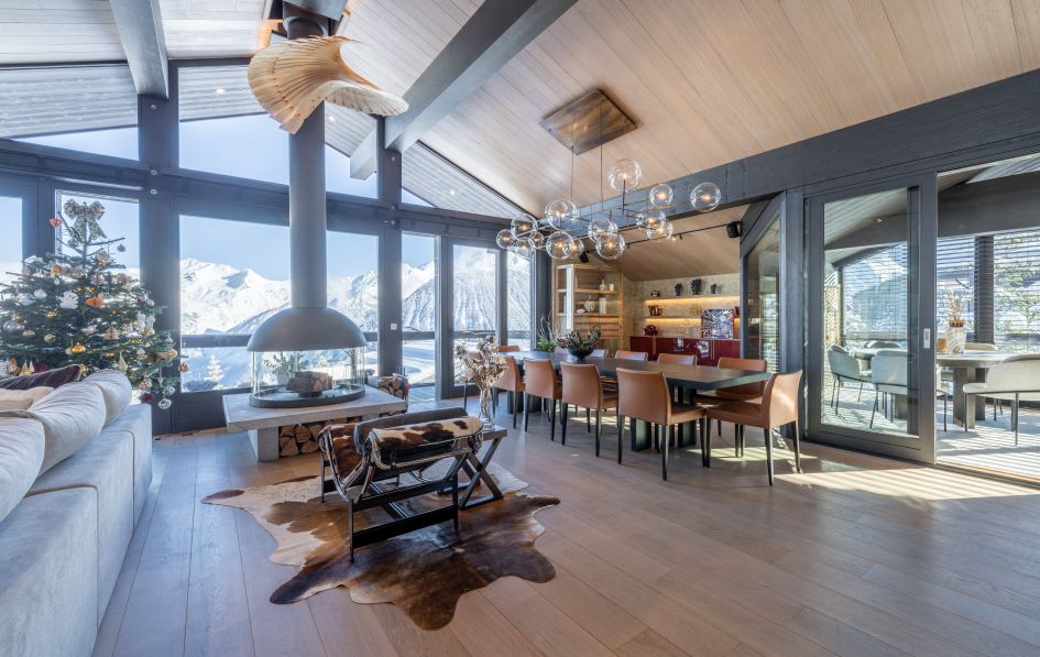 Living area showcasing beautiful views of the valley from Chalet B, Courchevel 1850