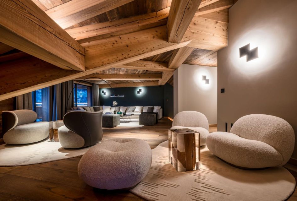 Stylish living room area of Chalet Hôtel Blythe, a fantastic luxury corporate ski holiday option, with stunning furnishings and modern design.