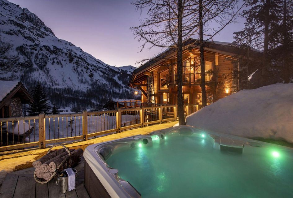 Hot tub and exterior of Chalet Machapuchare, a premier luxury ski chalet in Val d'Isère that's perfect for a stargaizng holiday.