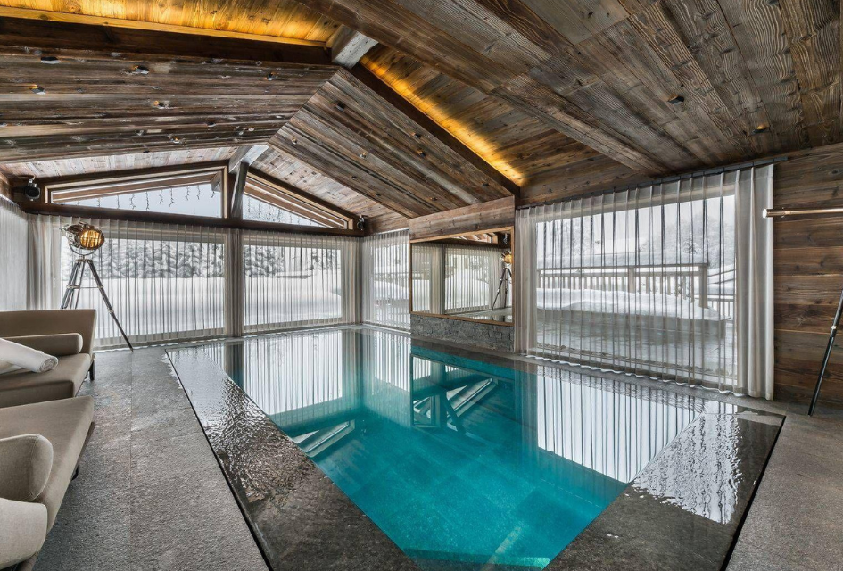 Indoor swimming pool of Chalet Des Sens, a top luxury corporate ski chalet for the ultimate company holiday.