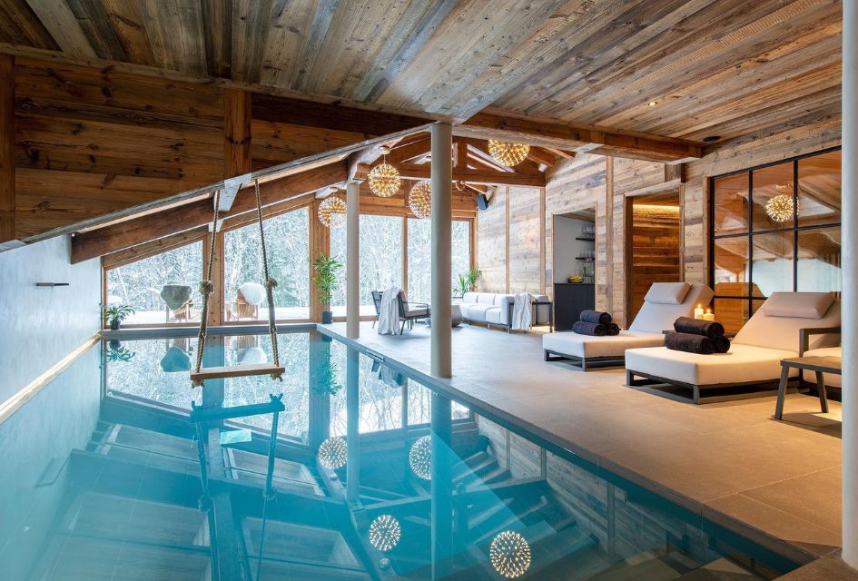 The swing above the indoor pool of Chalet Tataali, a truly unique ski chalet feature.