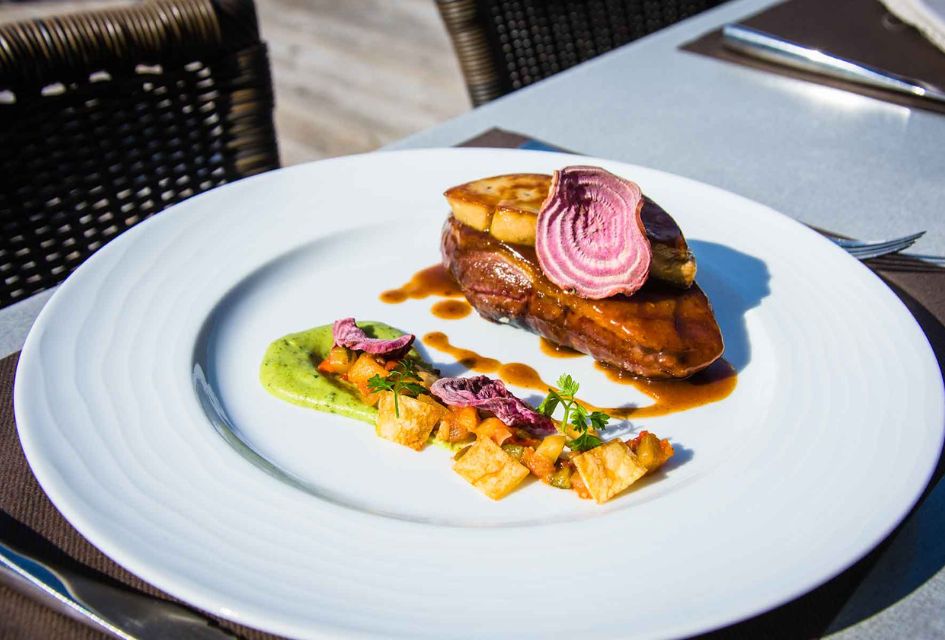 Duck Breast served on the terrace of L'Etoile des Neiges restaurant in St Martin de Belleville.