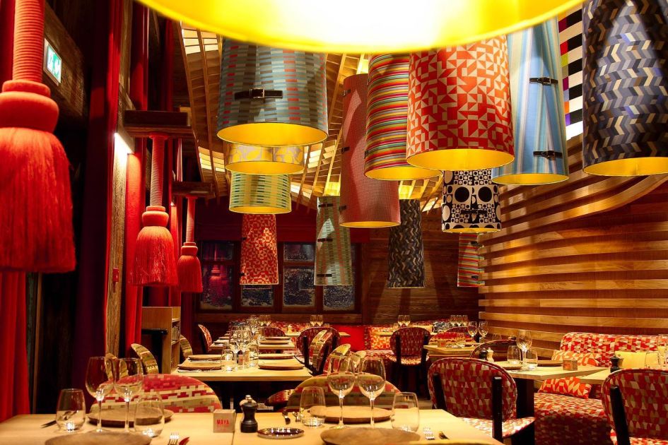 Inside the St Martin de Belleville restaurant, Maya Altitude's colourful dining room.